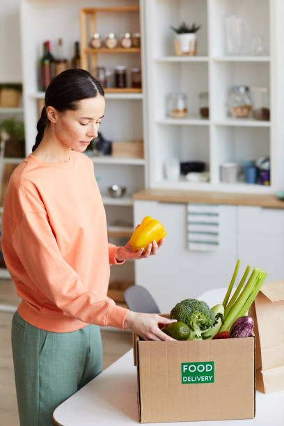 istock Woman buying fresh vegetables 1249716807