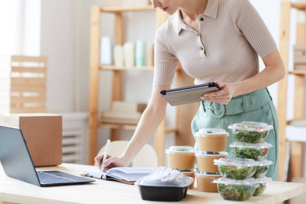 istock Woman working in food delivery service 1249716877