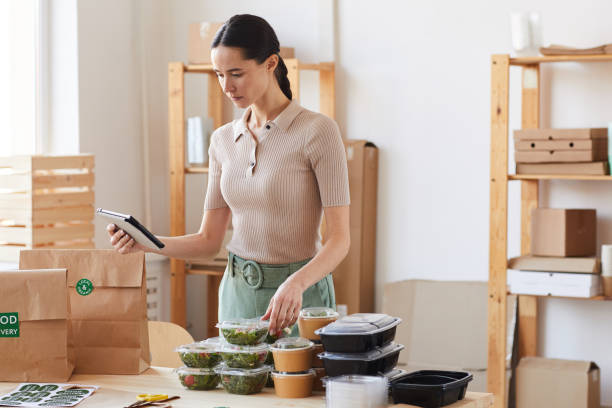 istock Woman working with online delivery 1249717024