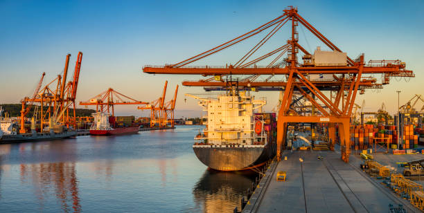 istock Container port in the rays of the setting sun. Gdynia, Poland 1249718736