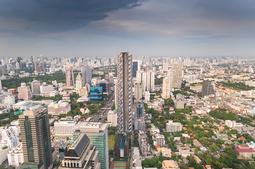 Panoramic view Cityscape business district at sapan taksin , silom , Sathorn and Chao Phraya river , Bangkok, Thailand) from aerial view high building at dusk