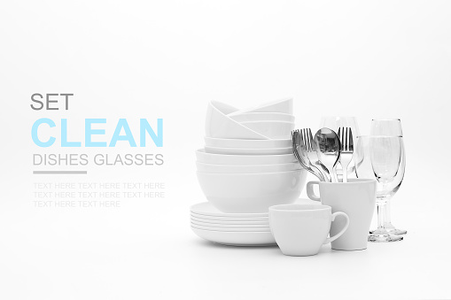 set clean dishes glasses on white background