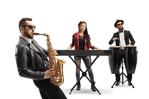 Musical band of three performing on sax, keyboard and conga drums isolated on white background