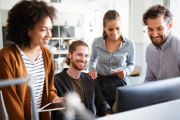 istock Business people, architects having discussion and working in office 1249735379