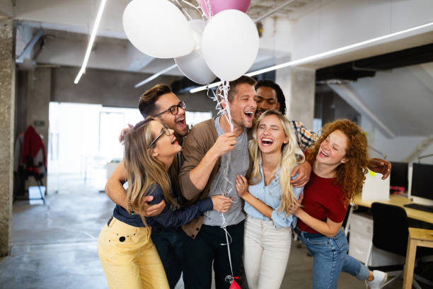 istock Successful company with happy employees in modern office 1249736241