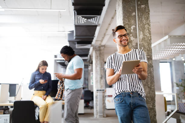 istock Business people brainstorming and chatting at workplace office 1249736609