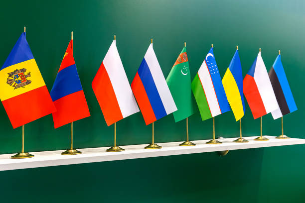 istock National flags of various countries are on the shelf. 1249737263