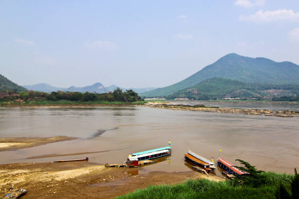 Pier of Yellow river on border of Thailand and Lao stock photo