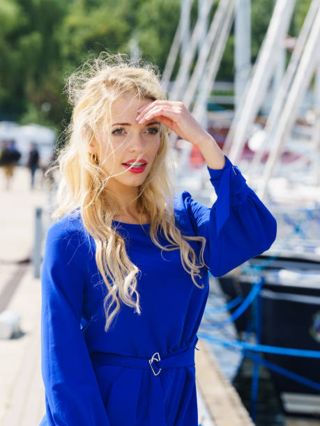 istock Fashion model wearing blue jumpsuit 1249738951