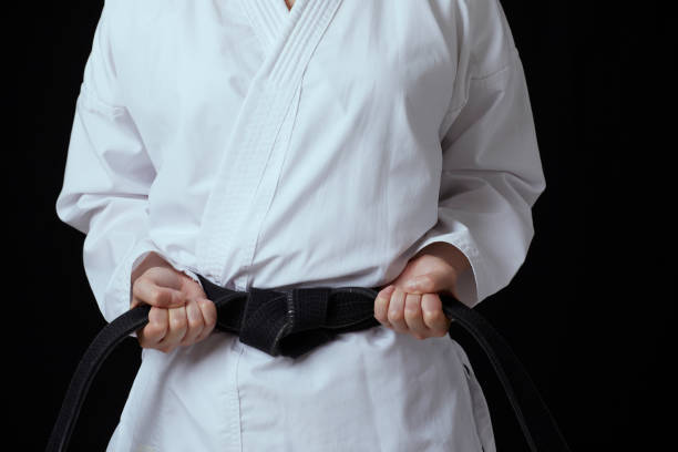 Detail photo of martial arts man with Black belt.