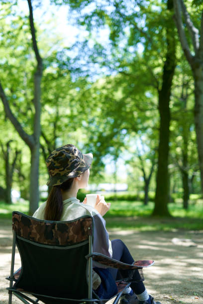istock A young Japanese woman enjoying a camp alone 1249742389