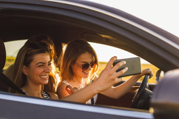 istock Friends capturing smiles before going on a road trip 1249742608