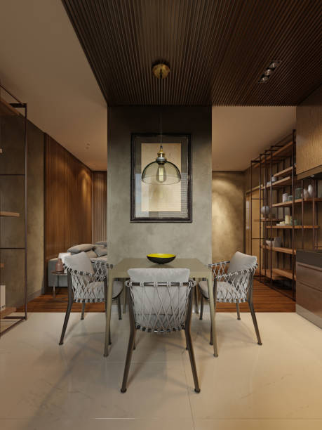 istock Dining room with contemporary style kitchen in dark brown studio apartments. Partition wall separating the living room and kitchen. 1249745027