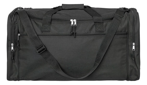 istock Travel bag in nylon with handles and shoulderstrap isolated on white 1249745217