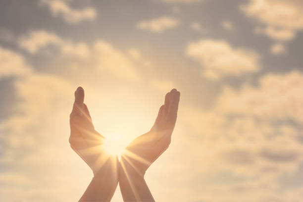 istock Woman hands, sun and sky with copyspace showing freedom or solar power concept 1249746932