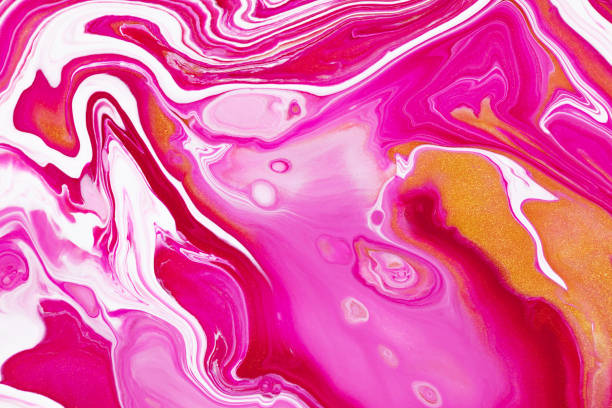 istock Fluid art texture. Background with abstract mixing paint effect. Liquid acrylic picture that flows and splashes. Mixed paints for website background. Golden, white and pink overflowing colors. 1249750173