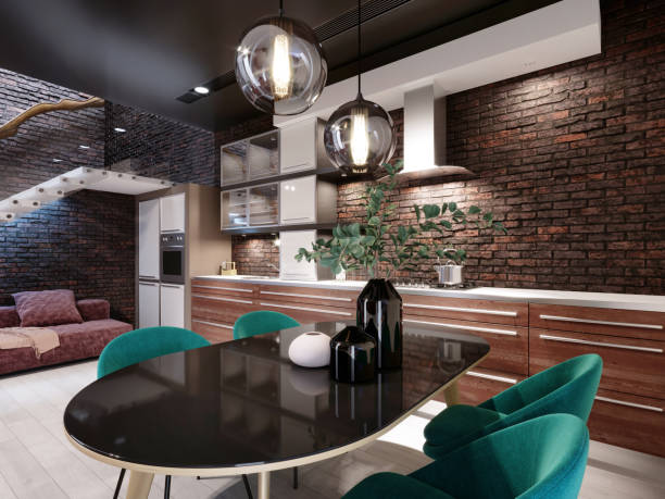 istock Newly designed kitchen with dining room, loft style, green chairs, brick wall. 1249750660