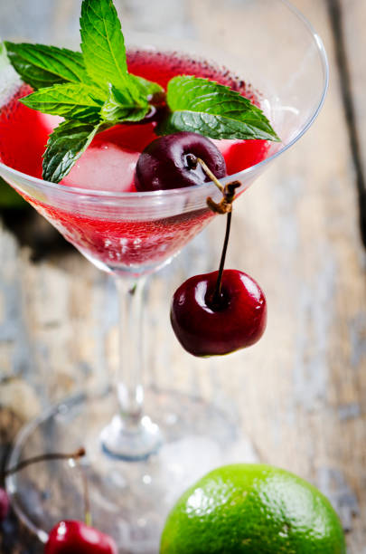 istock Cherry cocktail in martini glass 1249750883