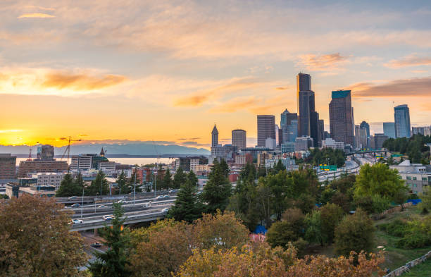 istock Seattle skylines and Interstate freeways converge with Elliott Bay and the waterfront background of in sunset time, Seattle, Washington State, USA. 1249752143