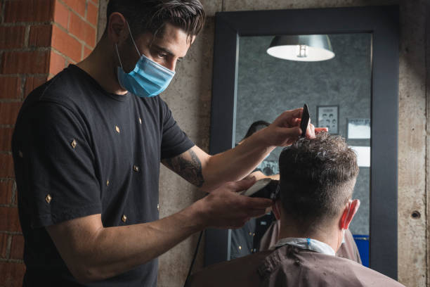 istock Hairdresser Working with mask 1249753255