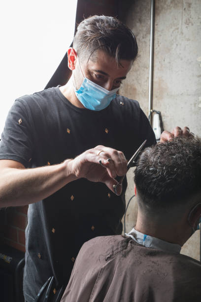 istock Hairdresser Working with mask 1249753303
