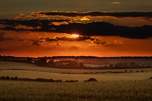Near Belchford, Lincolnshire, UK, July 2017, Sunset View of Lincolnshire Wolds near Belchford and the Bluestone Heath Road