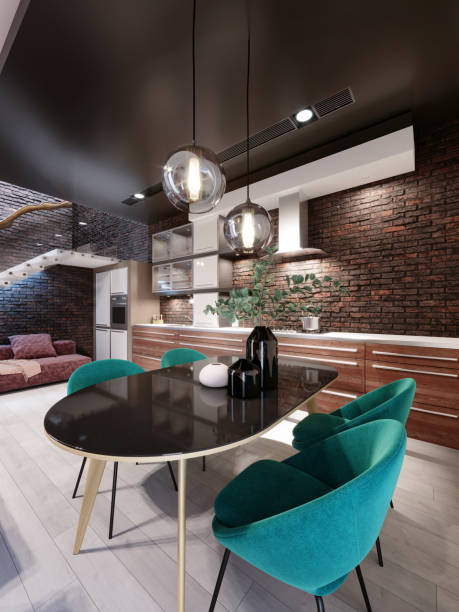 istock Newly designed kitchen with dining room, loft style, green chairs, brick wall. 1249753470