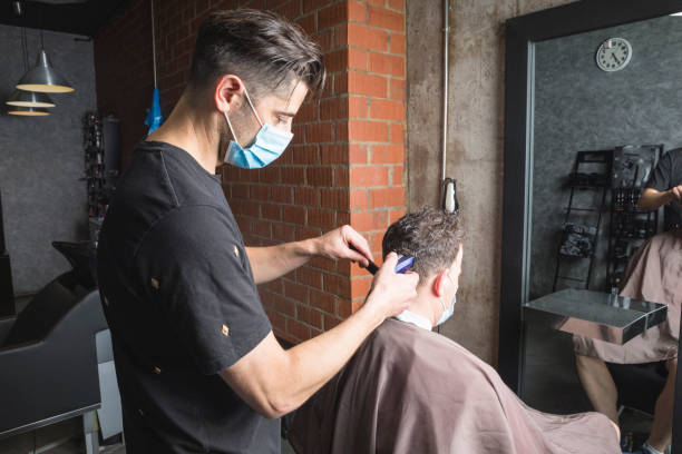 istock Hairdresser Working with mask 1249753535