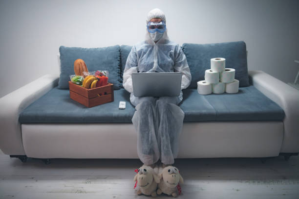 Quarantine and isolation during the virus outbreak - groceries and food in stock, working from home over the internet. Quarantine and isolation during the virus outbreak - groceries and food in stock, working from home over the internet. conspiracy photos stock pictures, royalty-free photos & images