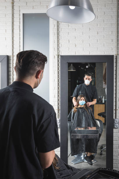 istock Hairdresser Working with mask 1249757547