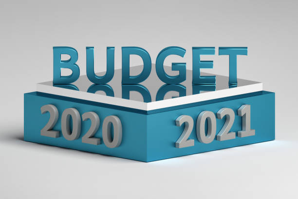 word budget standing on a podium pedestal with 2020 and 2021 year numbers - pension retirement benefits perks imagens e fotografias de stock