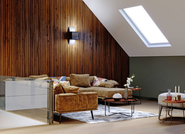istock A modern attic with a living space, a sitting area with a large corner sofa and a fireplace, a working space with a desk, a lot of flowerpots with greenery. 1249758554