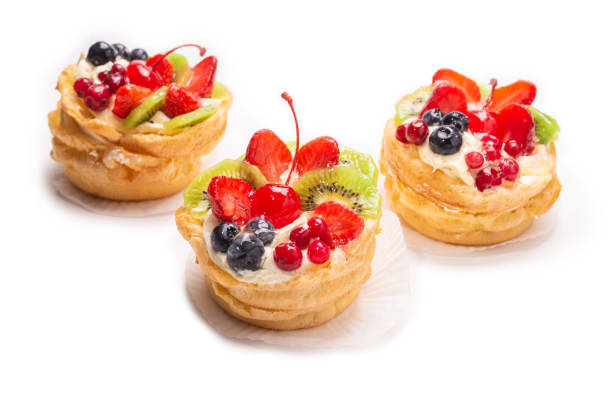 istock Home made cake with cream and fruits isolated. 1249758716