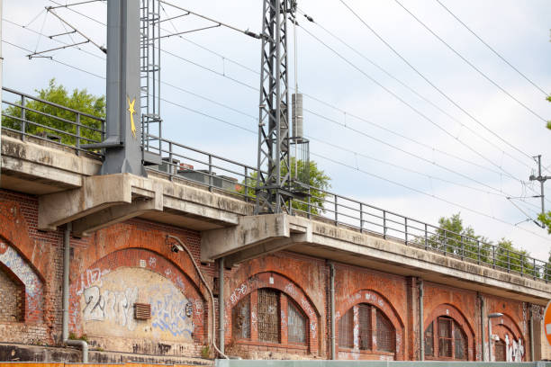 Upper railway tracks in Berlin Moabit near main station and Spreebogen Upper railway tracks in Berlin Moabit near main station and Spreebogen. On walls are graffitis. moabit stock pictures, royalty-free photos & images