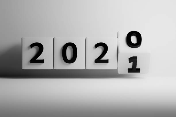 istock Changing 2020 and 2021 year number on white cubes 1249760564