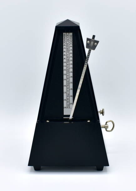 istock Black metronome isolated on a white background. 1249762470