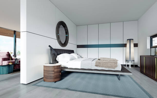 istock Modern designer bedroom in Scandinavian style, wardrobe, round mirror, panoramic window from floor to ceiling. 1249763289