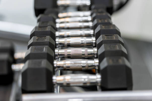 istock Close up view of dumbbells on the rack 1249763369