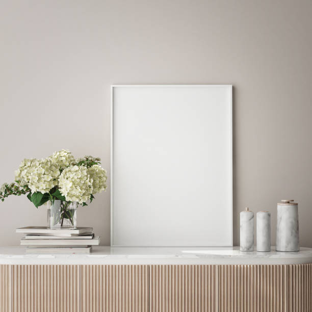 istock mock up poster frame in modern interior background, close up, living room, 3D render 1249763397