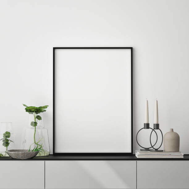 istock mock up poster frame in modern interior background, close up, living room, 3D render 1249763398
