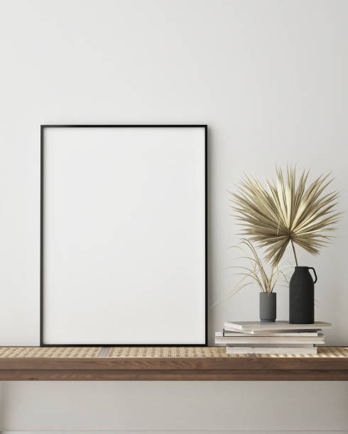 istock mock up poster frame in modern interior background, close up, living room, 3D render 1249763429
