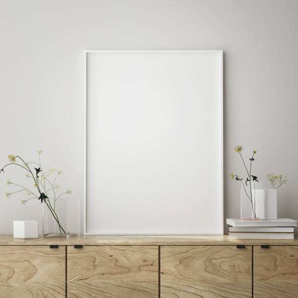 istock mock up poster frame in modern interior background, close up, living room, 3D render 1249763437