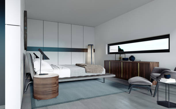 istock Modern designer bedroom in Scandinavian style, wardrobe, round mirror, panoramic window from floor to ceiling. 1249763629
