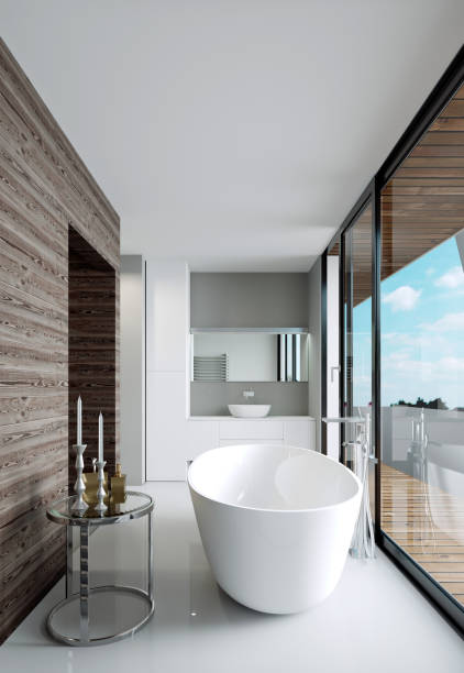 istock Modern nordic style bathroom. Bathroom with a large panoramic window and access to the terrace. 1249763836