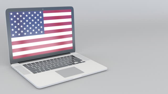 Opening and closing laptop with flag of the United States on the screen