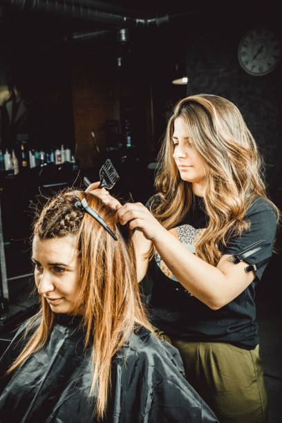 istock Hairdresser Working with client in salon 1249764183