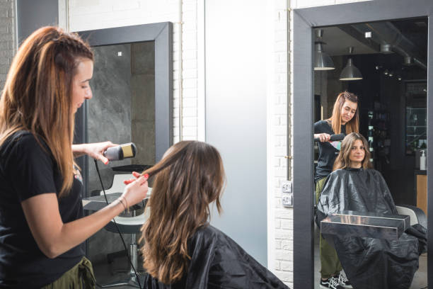 istock Hairdresser Working with client in salon 1249764733