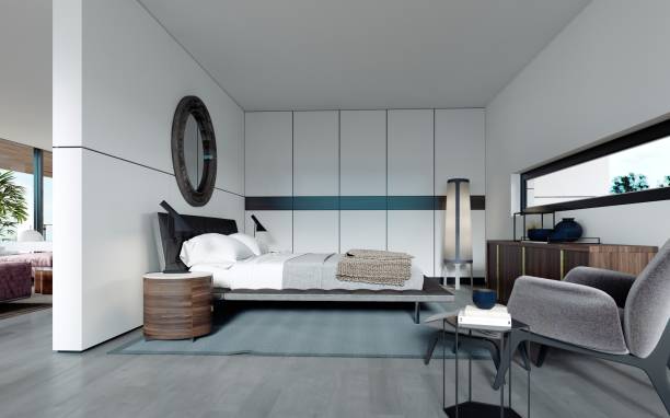 istock Modern designer bedroom in Scandinavian style, wardrobe, round mirror, panoramic window from floor to ceiling. 1249765270