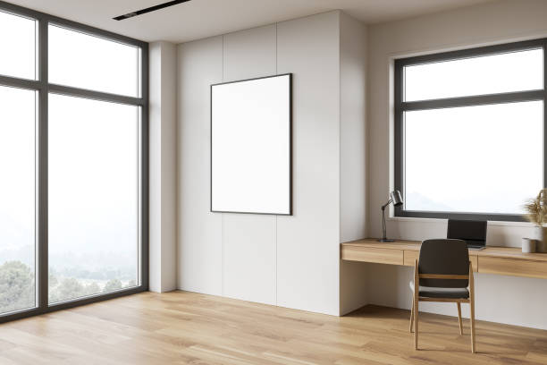 istock White and wooden home office corner with poster 1249772624