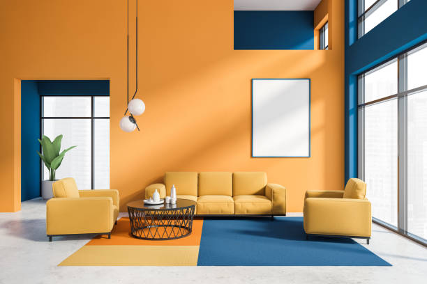istock Orange and blue living room interior with poster 1249773978